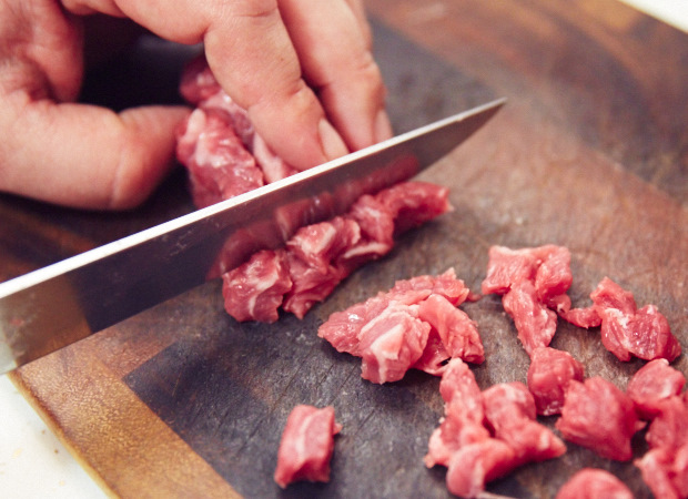 Chopping meat for sambusa