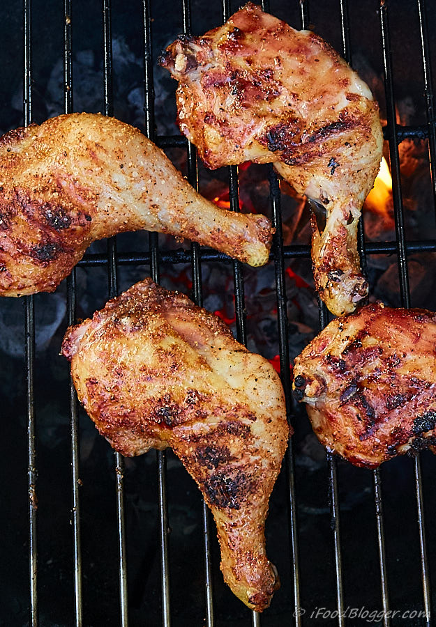 Super easy, super quick and lip-smacking delicious, kickin' grilled chicken legs. It takes only 5 minutes to prepare and 30 minutes to cook.