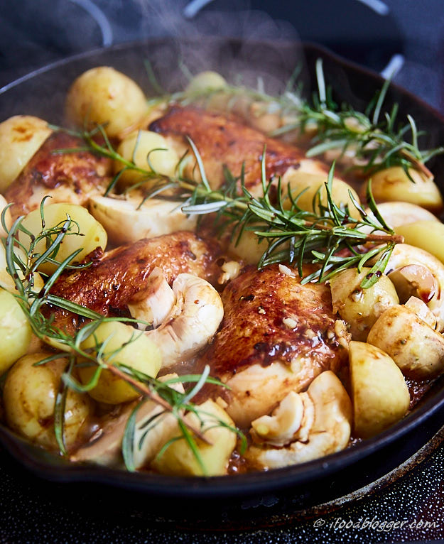 Oven Roasted Chicken Breast with Potatoes and Mushrooms... with garlic and rosemary... all cooked in one pan...including the crispy chicken!