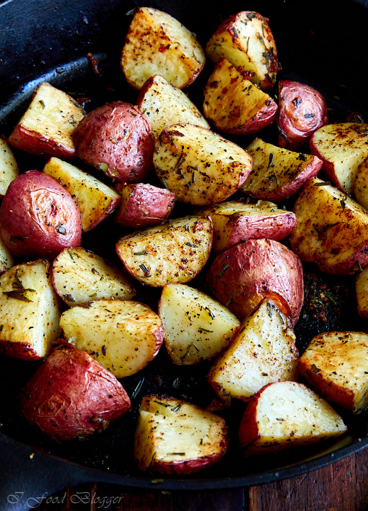 Roasted potatoes in a pan.
