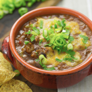 Burger chili is all about additional flavors that beautifully browned meat and caramelized onions and other vegetables bring, making it deliciously gourmet.