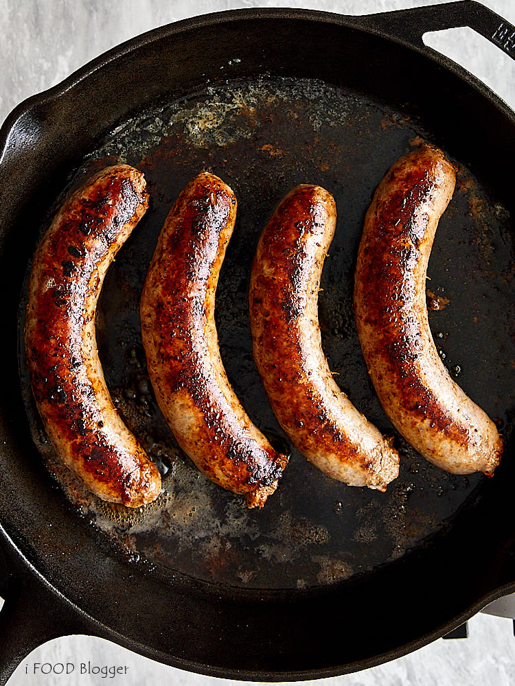 cooking brats in cast iron skillet