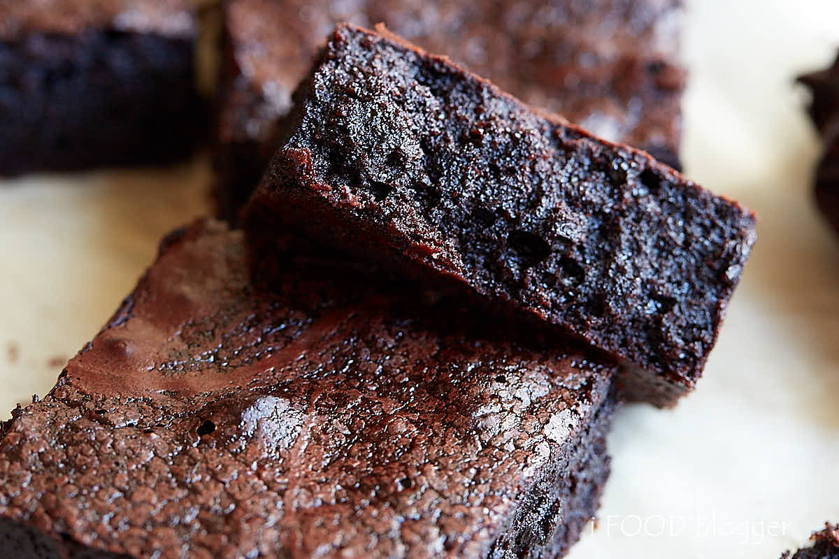 Chewy homemade brownies made from scratch, close up.