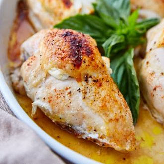 Baked Bone-In Chicken Breast with Goat Cheese and Basil