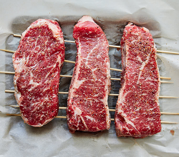 Salting steak in a fridge for a few hours before broiling makes them tender and more flavorful.