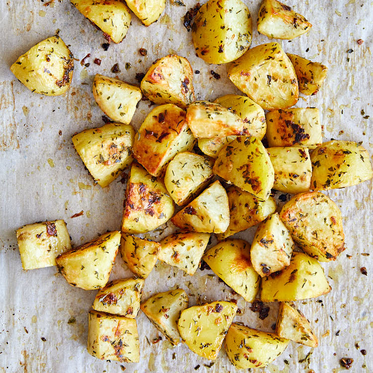 Garlic Roasted Potatoes - garlicky, crisp on the outside, creamy and buttery on the inside, super flavorful and easy to make, all in on one pan. | ifoodblogger.com