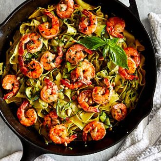 Homemade pesto shrimp pasta made quickly and easily, a great recipe for a busy weekday dinner. | ifoodblogger.com