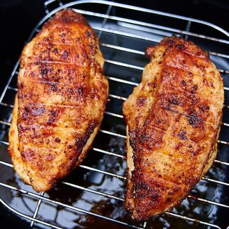 This air fryer chicken breast is crispy on the outside and very juicy inside. It's ridiculously delicious! This chicken breast tastes just like fried, only without an oily mess and added calories. I guarantee you, this is one of the best chicken breasts you can make. They are a must try! Oh, and they only take 30 minutes to cook. A great chicken breast recipe for keto, paleo, weight watchers and low carb diets.| ifoodblogger.com